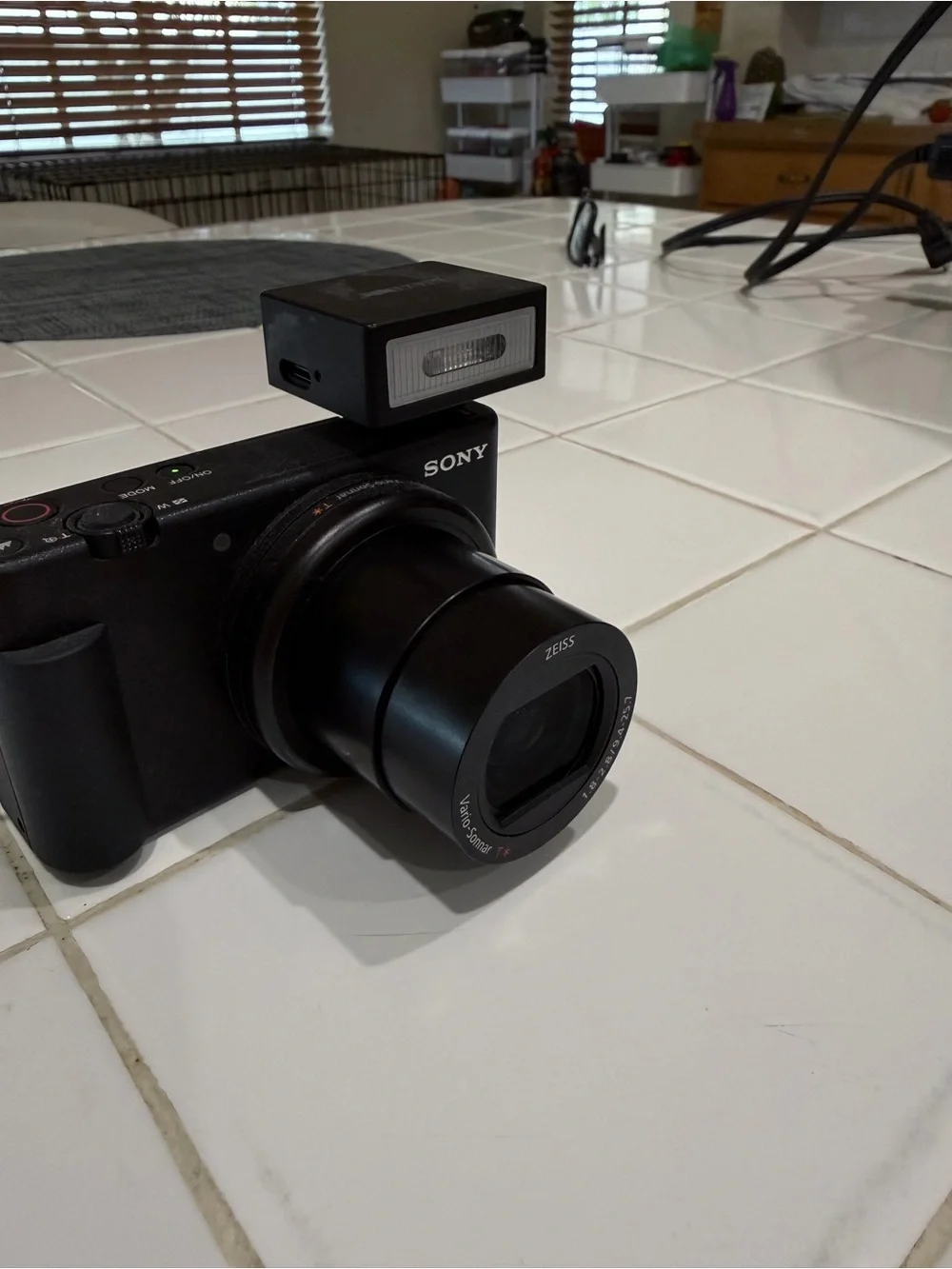 Sony Black Compact Digital Camera with Detachable Flash and Pink Strap
